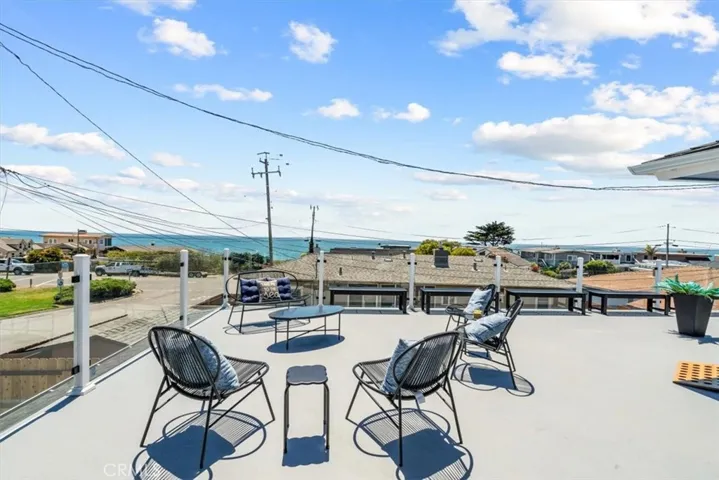 New 40 Foot Rooftop deck with glass panels and 3 entry doors.