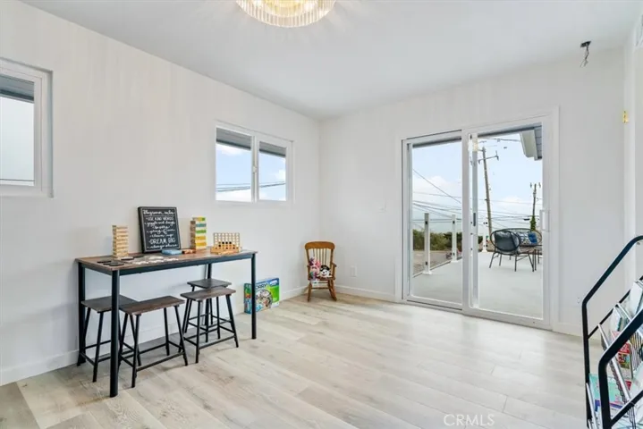First upstairs bedroom has new slider out to deck and ocean view.