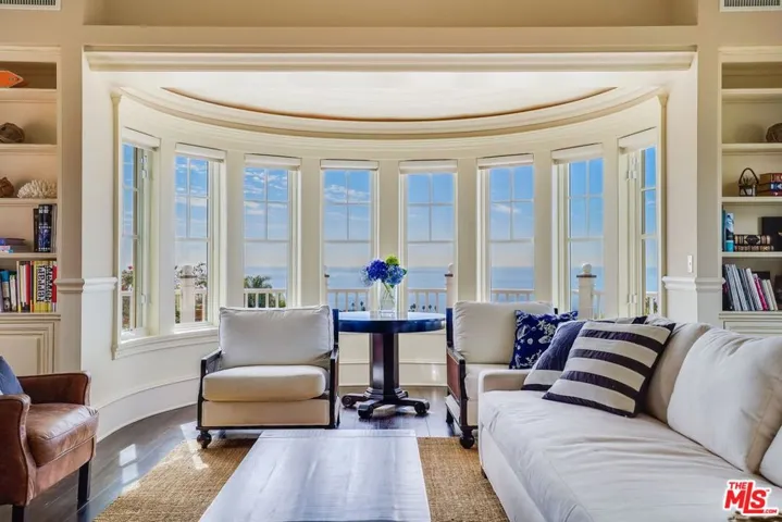 Formal living room w/ bar and