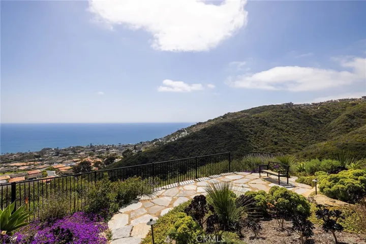 Thoughtfully designed gardens and reflection space are located on the lower part of your large 15,656 sq ft lot.