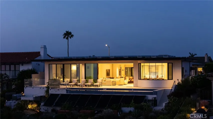 Evenings are as inspiring as daytime in this beautiful custom-lit home.