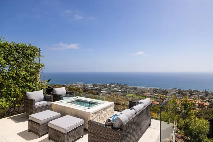 Firepit lounge area can also be enjoyed year-round on your private ocean-view patio.