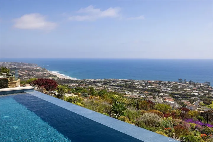 Soak in the sun and coastline, white-water views from your private infiinity-edge pool.