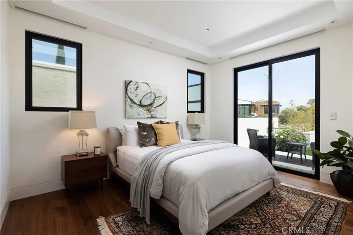 Front secondary bedroom features ensuite bathroom and private deck off your sliding doors.