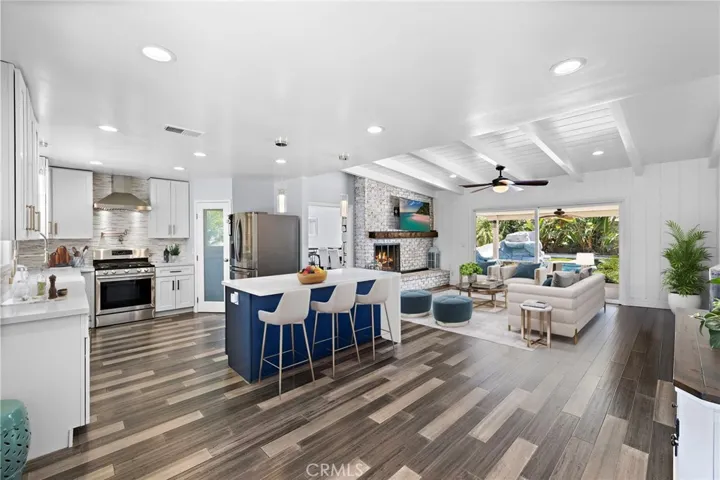 Great Room - Kitchen, Dining and Family Room Virtually staged furniture