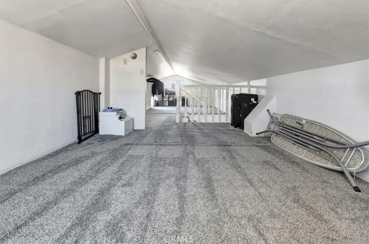 LOFT (Not included in upstairs square footage) for extra storage or kids play or flex space