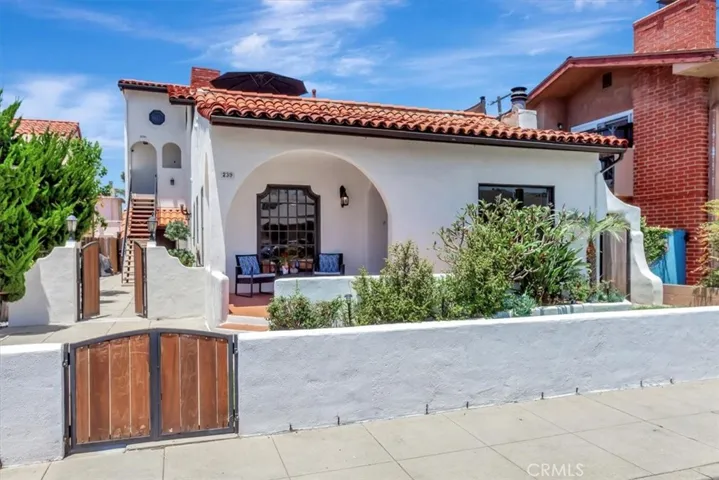 Front home, porch & yard and courtyard on left to stairs to Guest House rear unit.