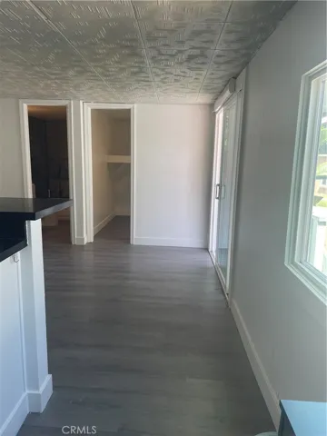 hall looking into living fresh paint-new baseboard