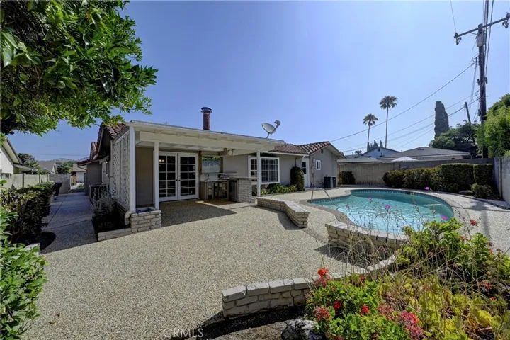 View of the large patio area and along the side of the house.