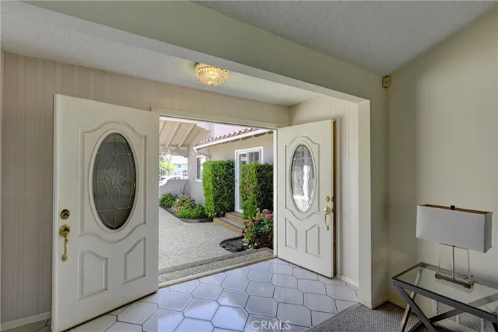 From the living room looking to the front double door entry.