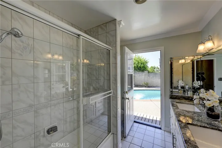 Bath #2 has a door to the backyard for easy access from the pool.