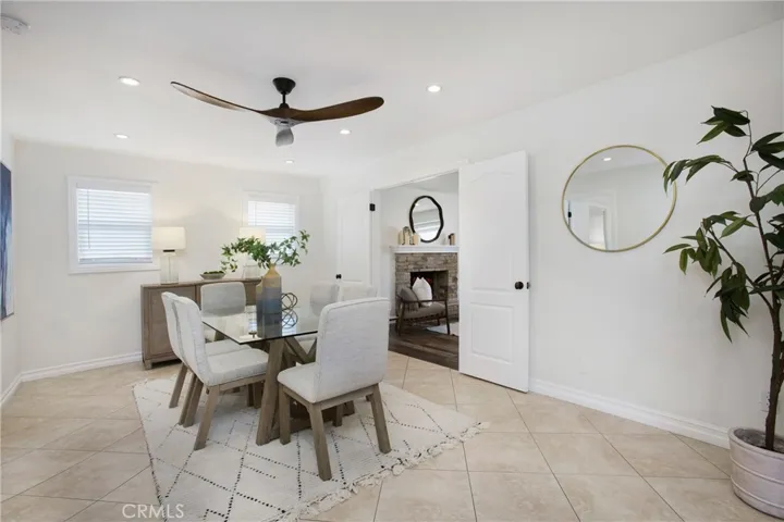 Dining room with double doors to the living room.