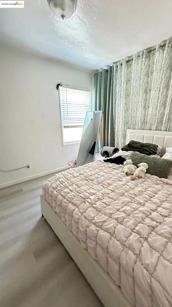 Bedroom with baseboards