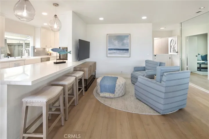 TV AREA OPENS TO FULL VIEW