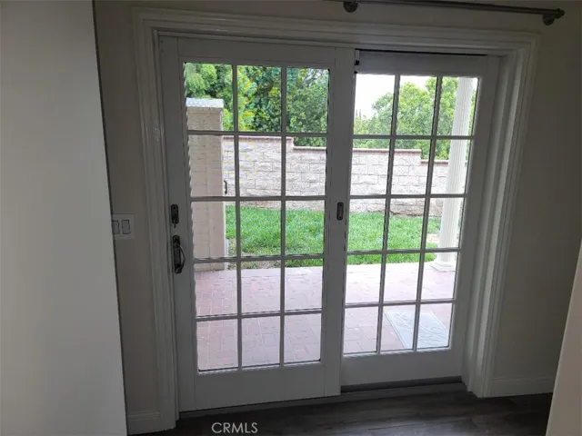 Hallway Slider to side yard with patio