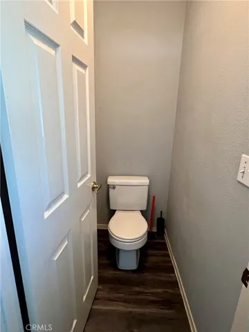 Enclosed toilet in En Suite bathroom.