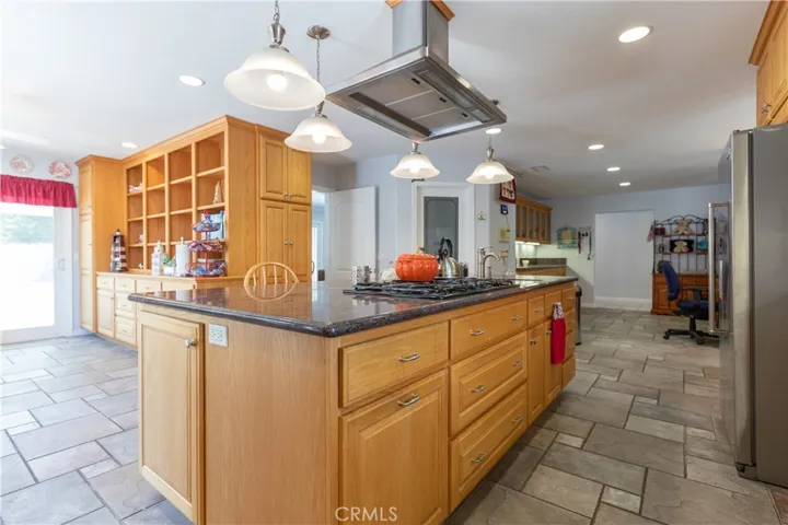 Kitchen opens to the  breakfast room and flex room