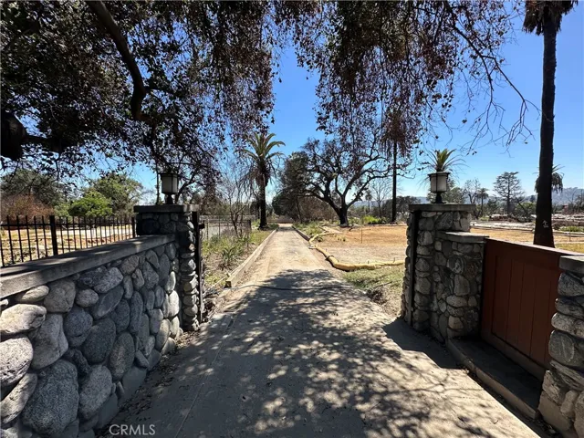 Gated entrance with long driveway