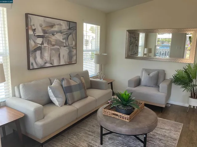 Front living room with bed and bath off to side