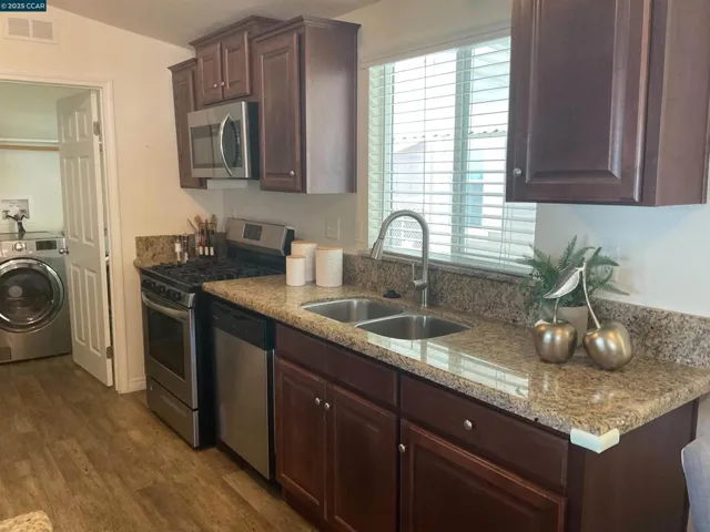 Full kitchen with gas range dishwasher and lots of​​‌​​​​‌​​‌‌​​‌​​​‌‌​​​‌​​‌‌​​‌‌​​‌‌​​​​ storage