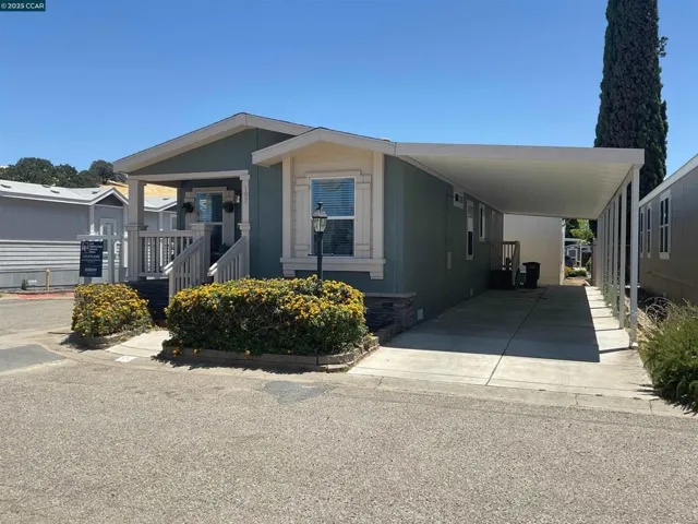 #109 With tandem covered carport area and back entrance