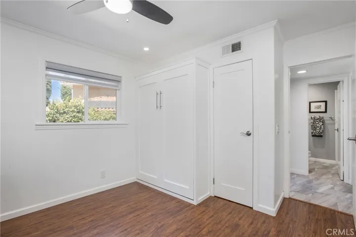 Main floor bedroom - murphy bed and walk in closet