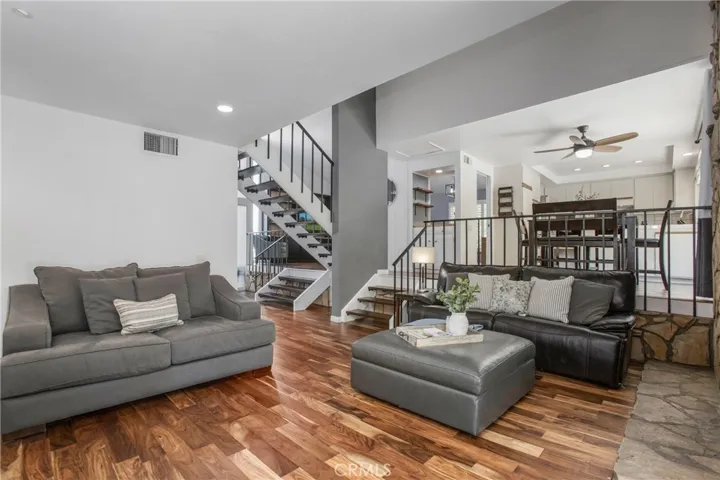 Open floor plan centers around bar - perfect for entertaining
