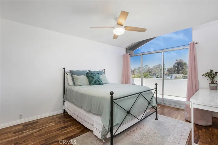 Secondary bedroom both with closet organizers, mountain views and ceiling fans