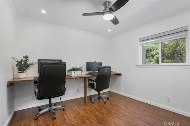 Main floor bedroom with solid walnut desks