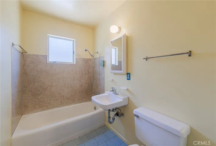 Full bathroom off hallway.