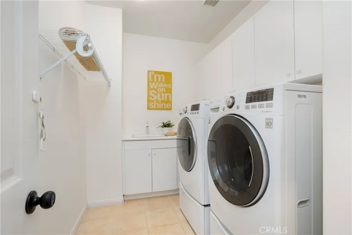 Upstairs laundry room.