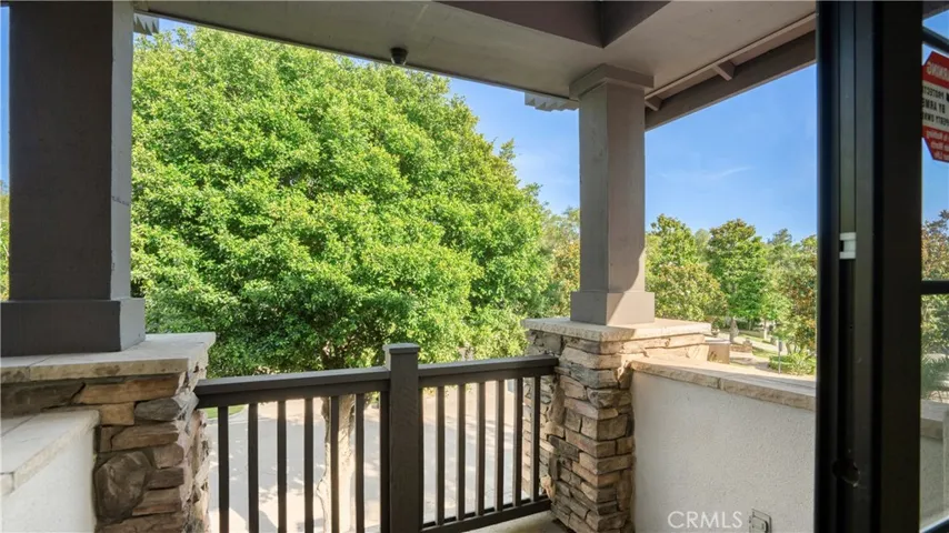Balcony off of the BONUS ROOM /GAMEROOM. This extra large room can also be a 6th bedroom.