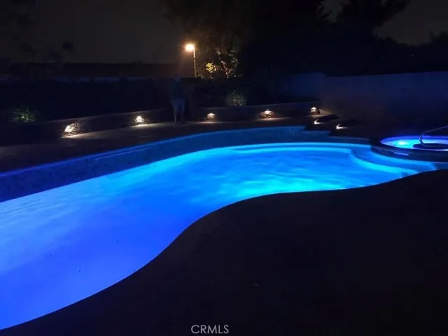 Pool at night. Color may vary.
