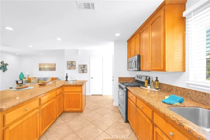 Upgraded kitchen with tons of cabinets and a Pantry!