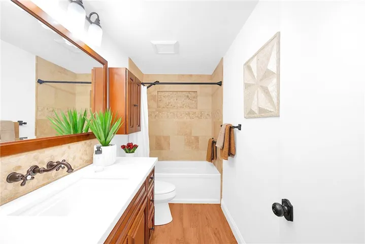 You will love the Tile flooring with Wood-Style finish.