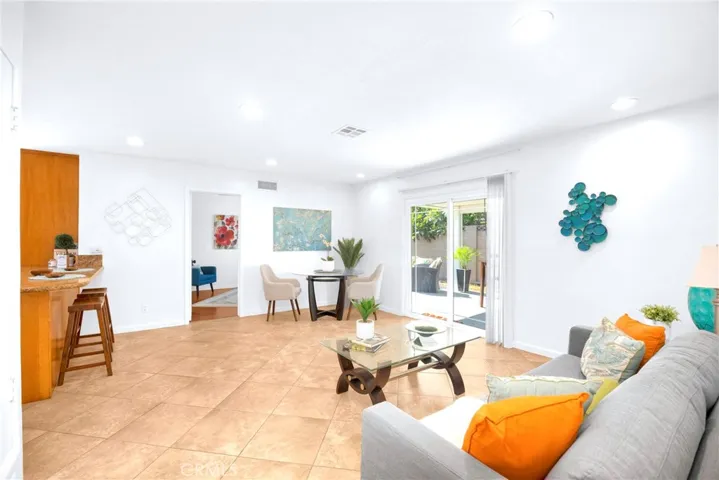 You will love the attractive low maintenance flooring. The light gives it the right sand color hues.