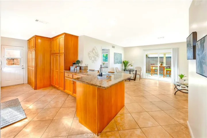 Breakfast bar with spacious Granite Counters can function as a Prep Station too!