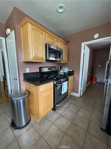 Updated kitchen. Microwave range hood. GAS range.