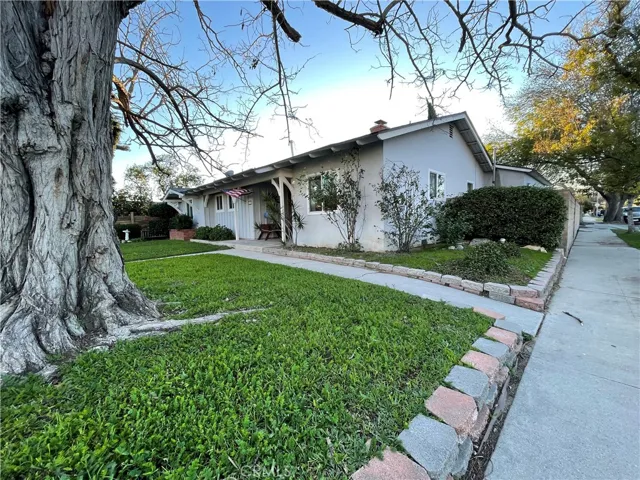 Front and Side of House, Corner Lot!