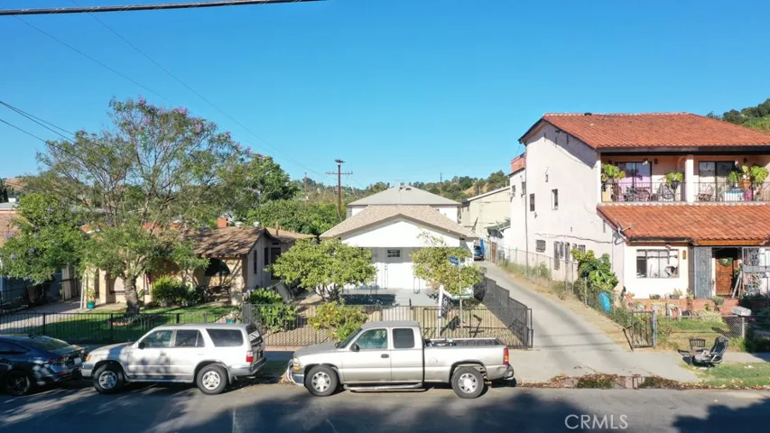 Dont miss out on this one of a kind triplex, and potentially build 4th unit in the garage