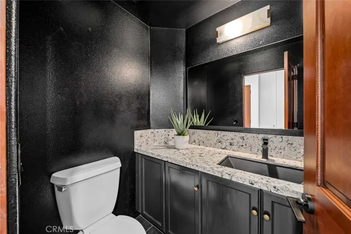 Dramatic Powder Room on the Main Floor.