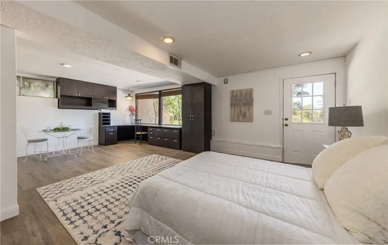 VOILA!  DOWNSTAIRS GUEST ROOM OR OFFICE WITH BATHROOM AND SEPARATE ENTRANCE!