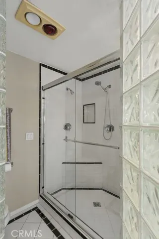 Shower in primary bedroom