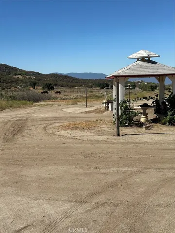 Gazebo looking out to horses.