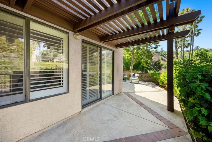 Patio view from Family Room - patio wraps around to Living Room.