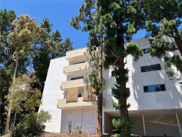 view of the unit from the side.  It's the middle balcony
