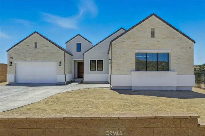 Front Elevation: Silverado Modern Farmhouse - Ridge Collection at Bella Vista - Photo of Homesite 59.  Home is still under construction.