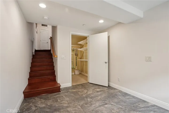 Utility Room with Walk-In Closet