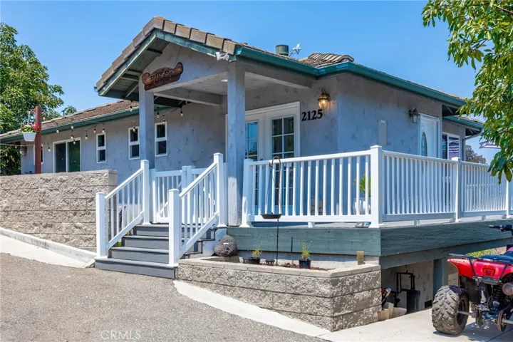 Front Entry with fenced front porch