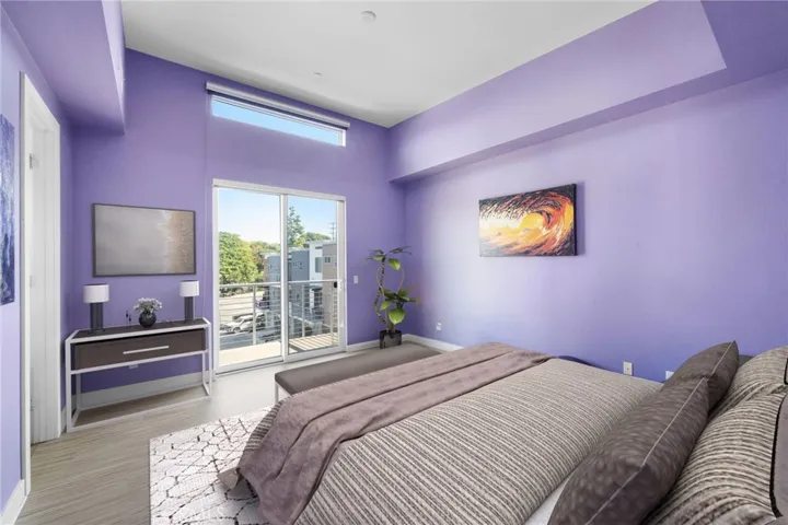 Primary suite with walk-in closet and deck. Peaceful park views.